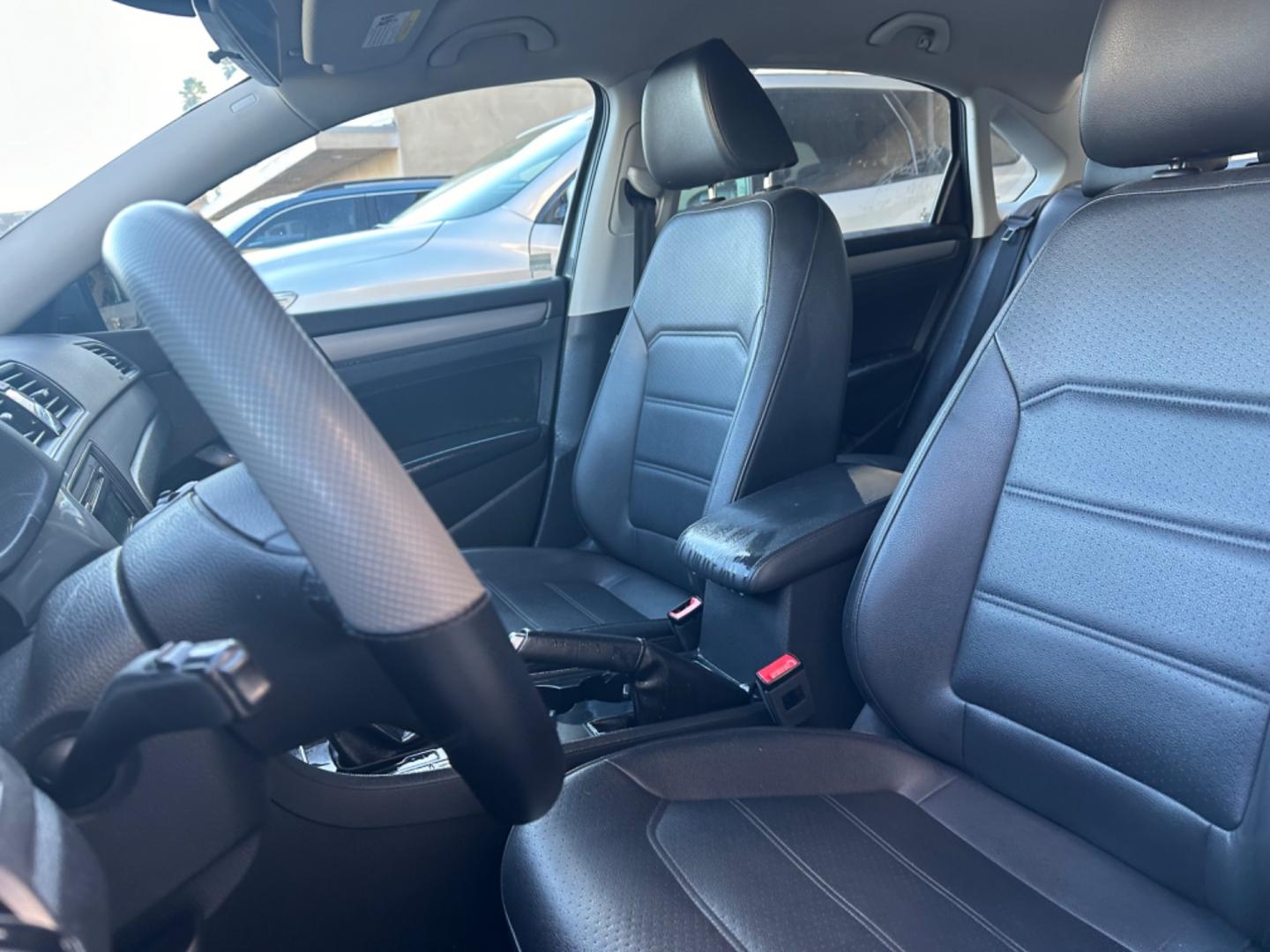 2015 Gray /Black Volkswagen Passat leather (1VWAT7A39FC) with an 4 CYLINDER engine, Automatic transmission, located at 30 S. Berkeley Avenue, Pasadena, CA, 91107, (626) 248-7567, 34.145447, -118.109398 - iscover Refined German Engineering: 2015 VW Passat Wolfsburg Edition - Now at Our Pasadena, CA Dealership Embrace the perfect blend of luxury and performance with the 2015 VW Passat Wolfsburg Edition, available at our BHPH dealership in Pasadena, CA. This exquisite model symbolizes Volkswagen's c - Photo#2